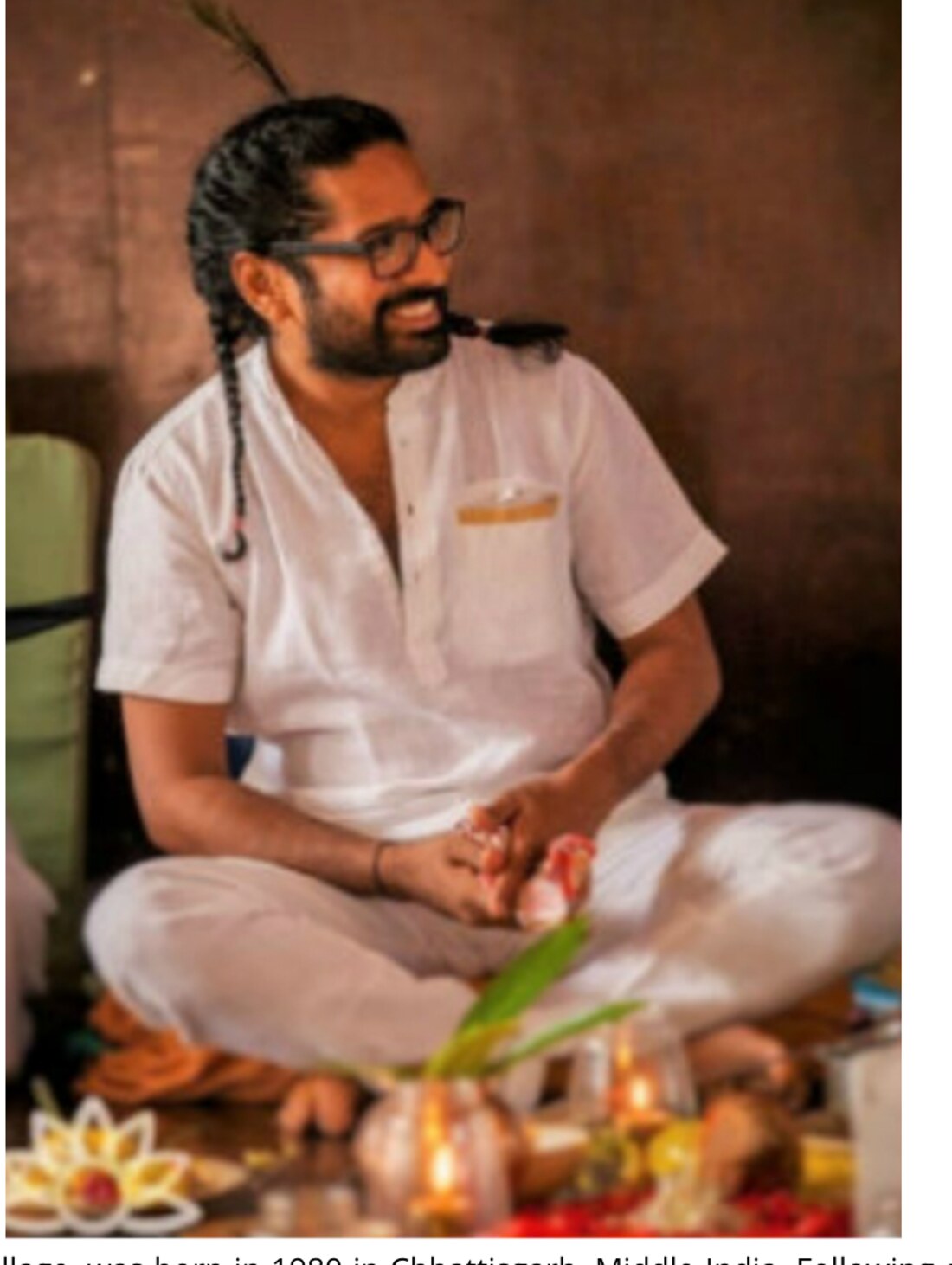 Yogi Tarun Kranti Agarwal seated in a traditional ceremony